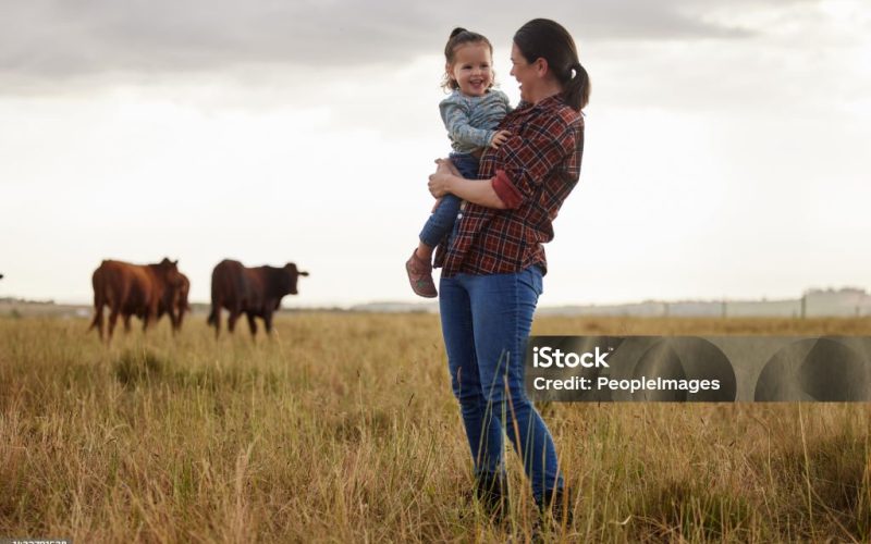 Sustainability, agriculture and countryside farm with a happy family, mother and daughter bonding in nature together. Loving parent and child having fun exploring outdoors, laughing and being playful